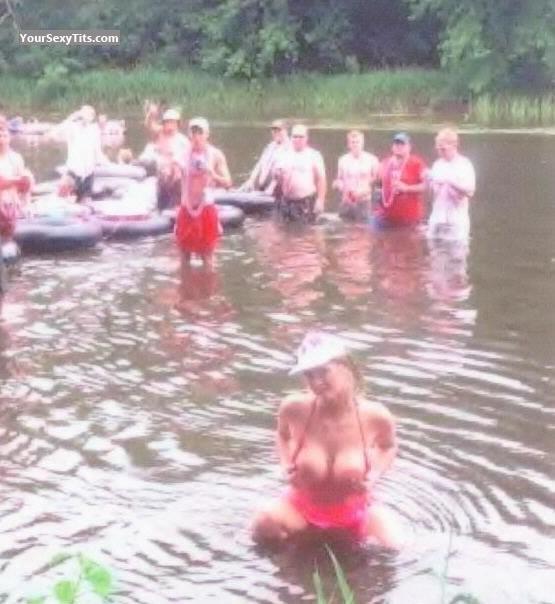 Tits pop out during a river tubing adventure